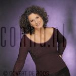 08-06-2004 Karin de Groot at studio in Amsterdam, by order of KRO. 

[keywords]Posed, Half Length, Smiling[/keywords]